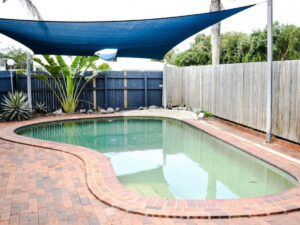 Beach living, fully furnished apartment with pool.
